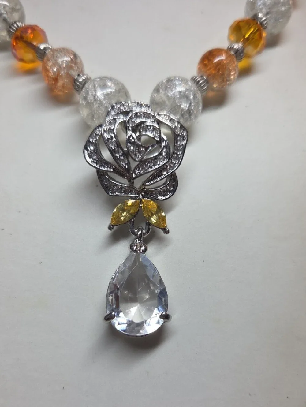 Elegant Rose Pendant Necklace and Earrings Set in Orange and Clear Glass Crystal